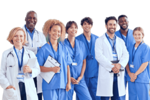 Portrait Of Smiling Medical Team Standing In Modern Hospital Building 1.png