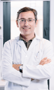 portrait of handsome eye doctor sitting with ophth 2022 01 11 14 50 36 utc.png