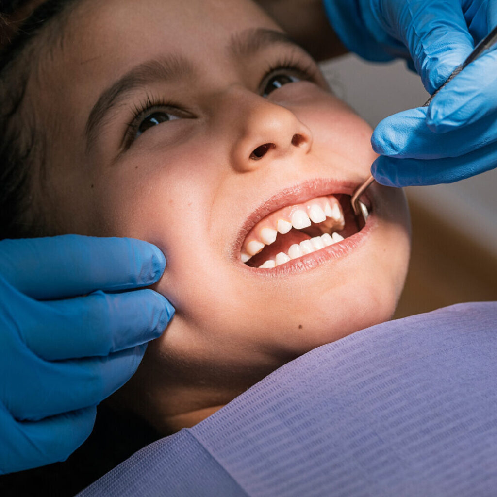 close up of dentist during a dental intervention w 2021 08 29 09 43 57 utc (1)