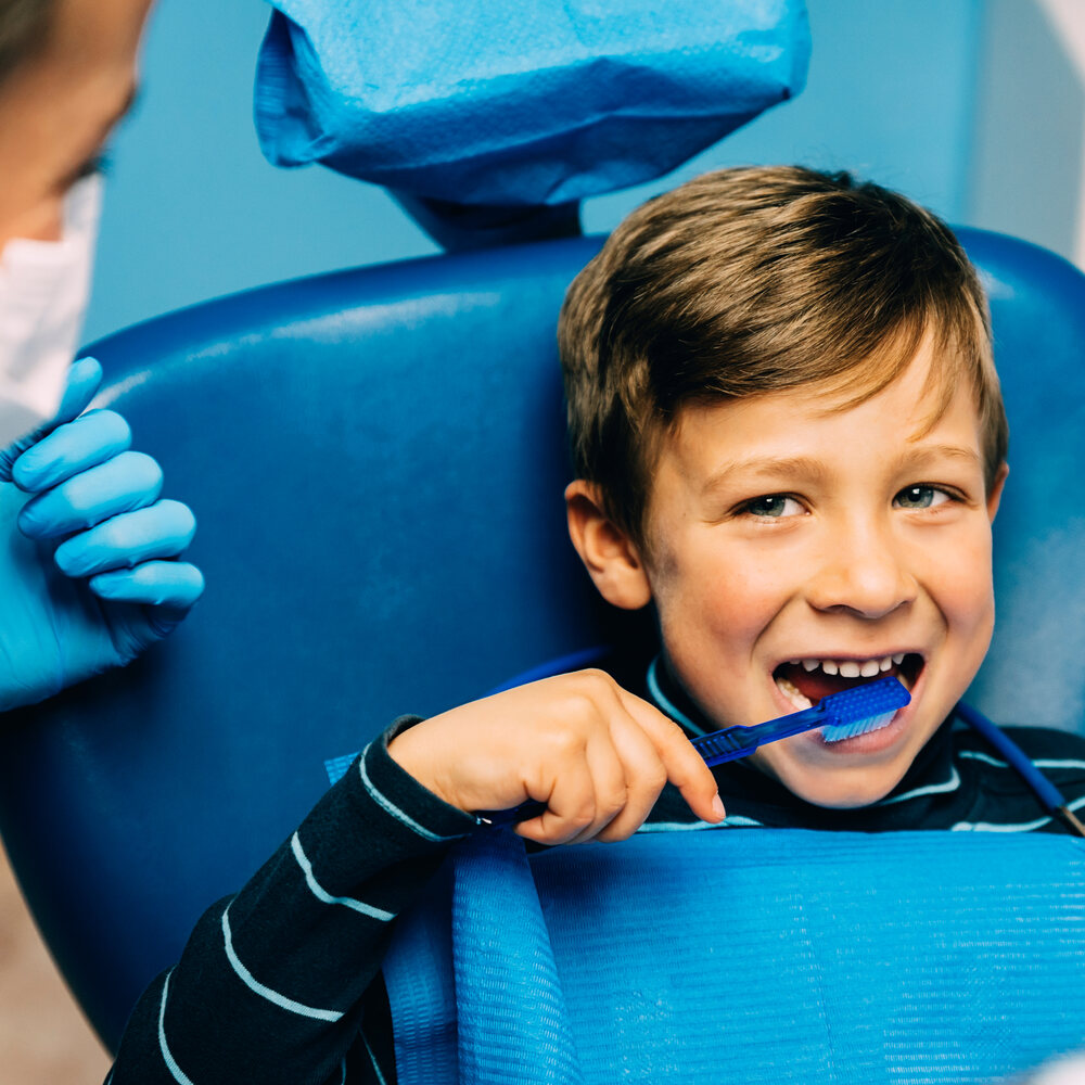 doctor dentist teaching a child to brush teeth 2021 08 27 22 49 33 utc (1)