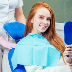 redhaired ginger lady checking teeth in mirror at 2022 05 12 00 51 02 utc