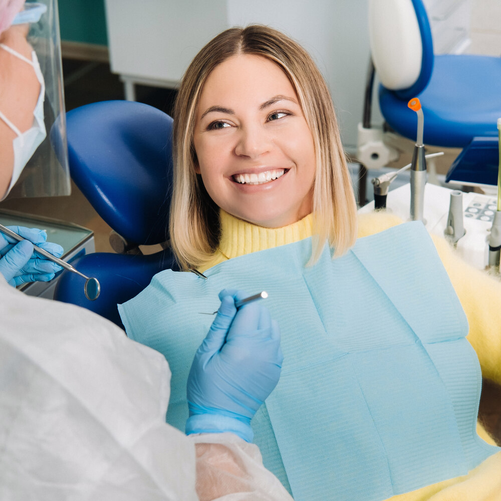 the girl smiles at the dentist and looks at her 2021 12 13 19 35 06 utc (1)