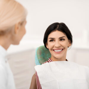 woman being happy at her future teeth whitening 2022 01 27 22 52 18 utc (1)