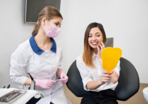 woman with female dentist checking their teeth at 2022 05 11 00 33 32 utc